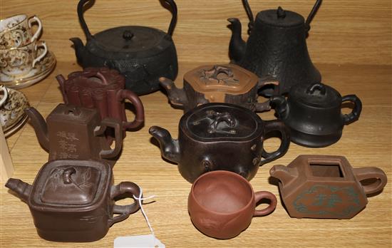 7 Yixing pottery teapots, cup and 2 Japanese iron teapots